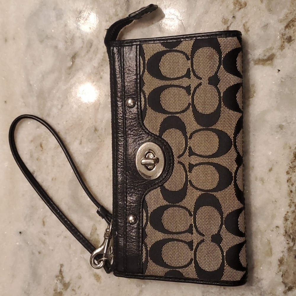 Coach Black Fabric and Leather Wristlet Slight wear on leather slots Take notice